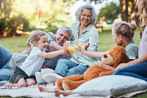 grandparents with grandchildren outside | bone grafting bellevue