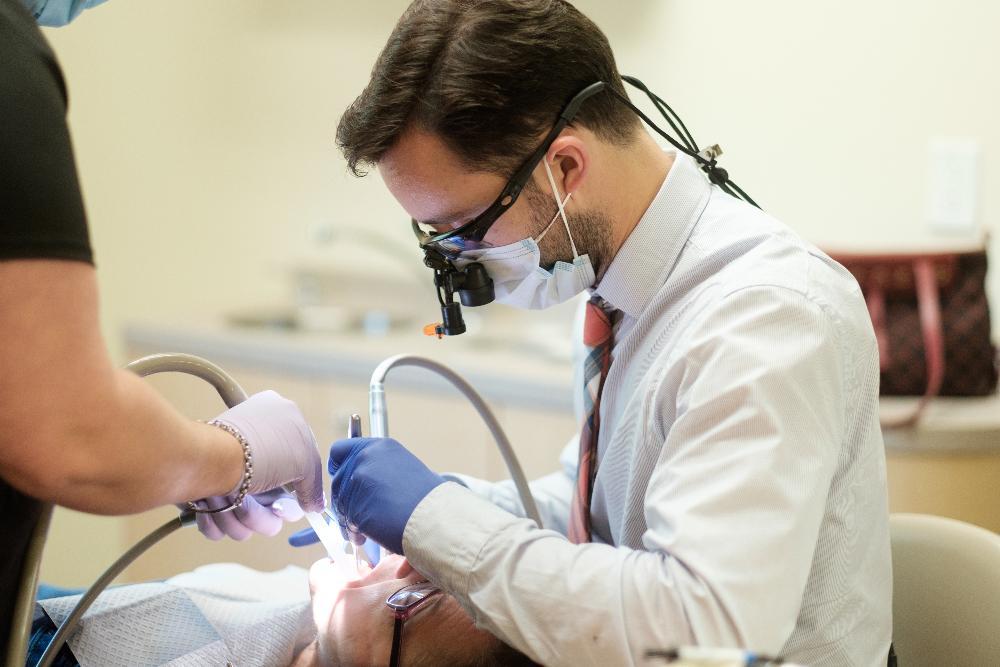 dr justin poff working on a patient | emergency dentist bellevue tn