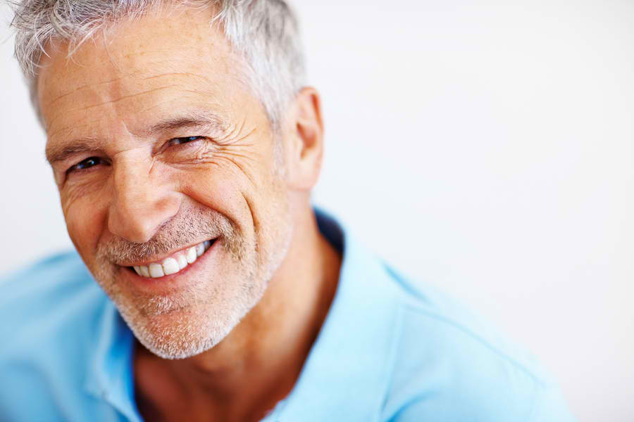 older man in blue shirt | bone grafting bellevue tn