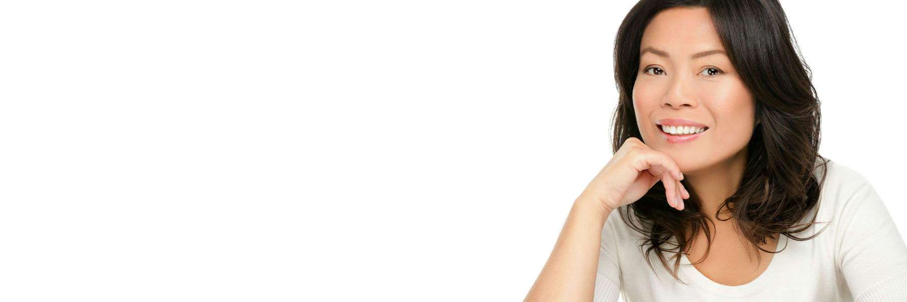 woman with black hair smiling | dentist in bellevue