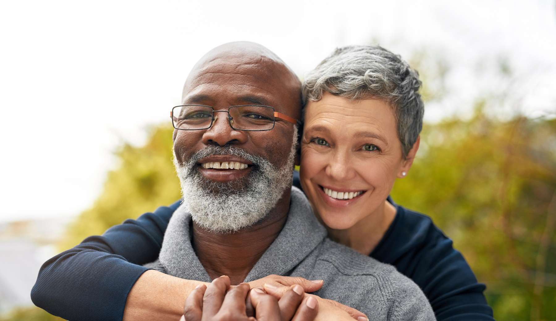 couple hugging outside | dentist bellevue tn