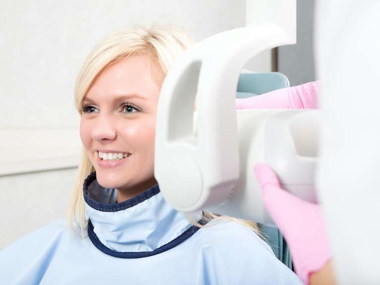 patient with digital x-ray technology | poff dental associates